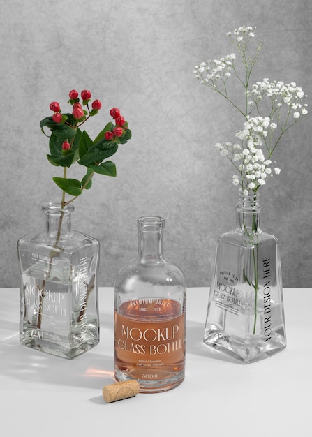 PSD glass vase with wine bottle and flowers