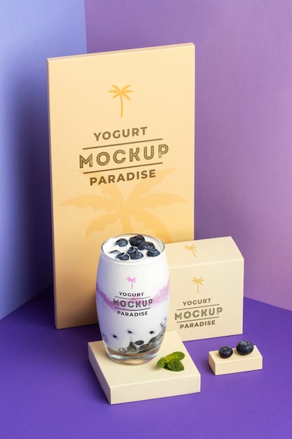 Glass of yogurt mock-up with blueberry fruits