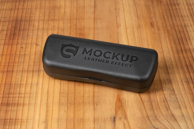 PSD glasses case mock-up with wood background