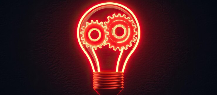 PSD glowing red light bulb with gears inside