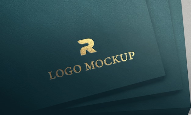 Logo inciso in oro su ciano modello di carta ruvida