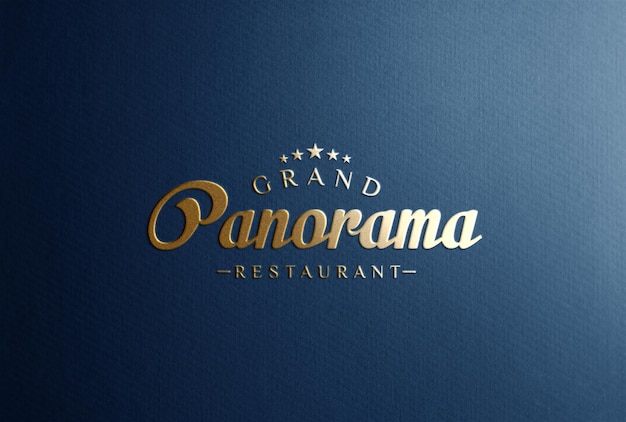 Mockup di logo in lamina d'oro su carta blu