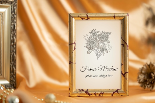 gold frame mock-up with textile background