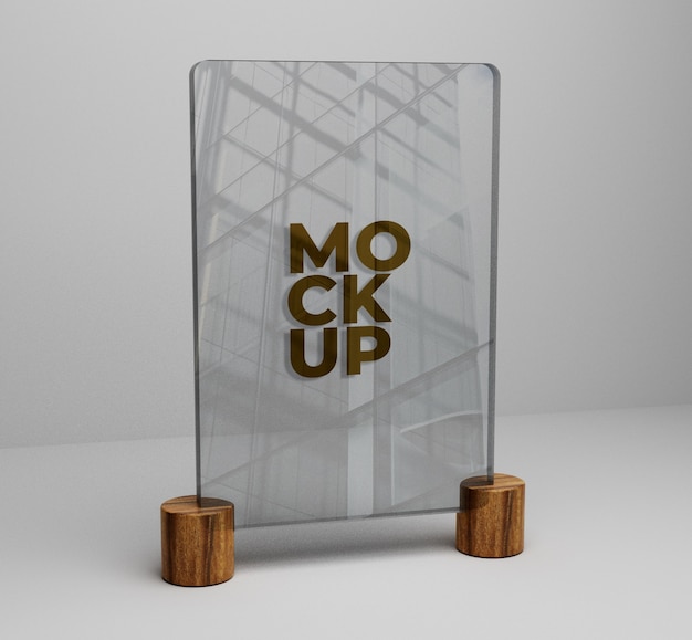 Mockup logo oro su vetro su fondo in legno