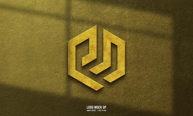 Gold logo mockup on wall texture