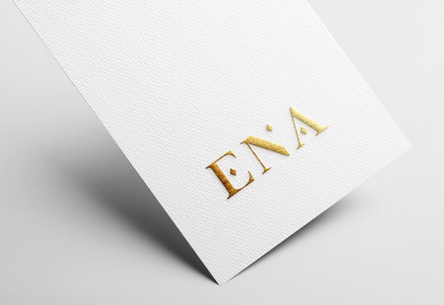 Golden emboss logo mockup on white business card