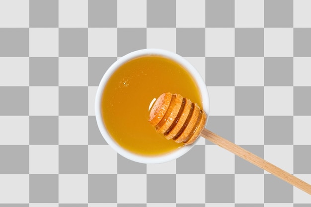 golden honey with a wooden dipper in a bowl isolated on white png