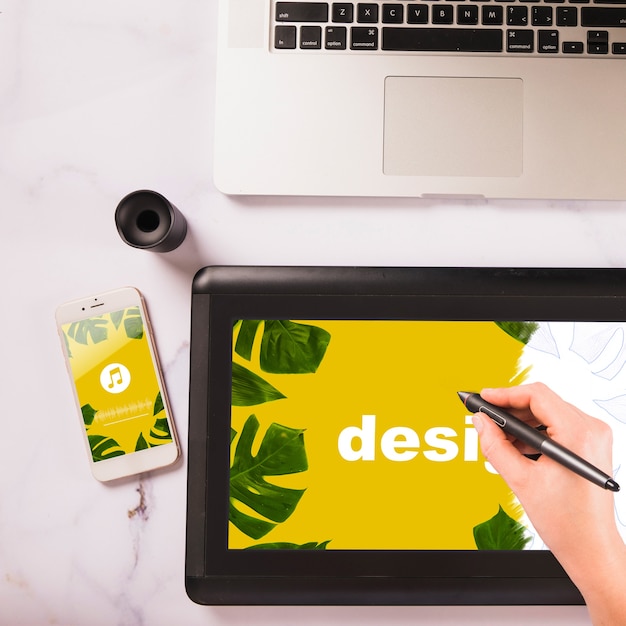 graphic tablet mockup and various technological devices