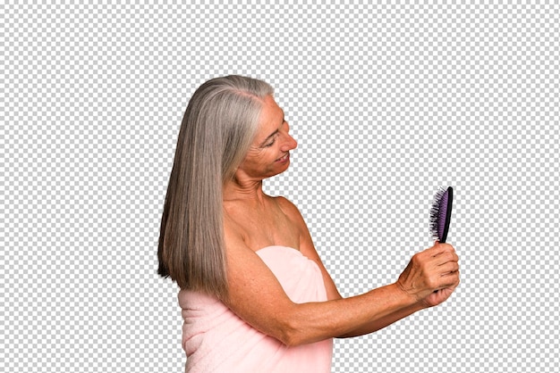 Gray hair senior pretty woman with a hair comb beauty concept