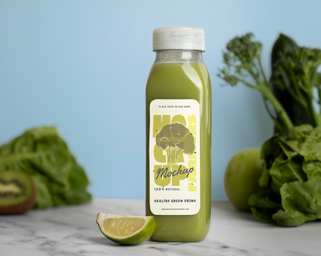 Green drink bottle mockup with healthy food