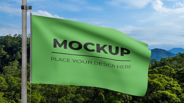PSD green flag mockup for you design with beauty landmark mountain forest scenery