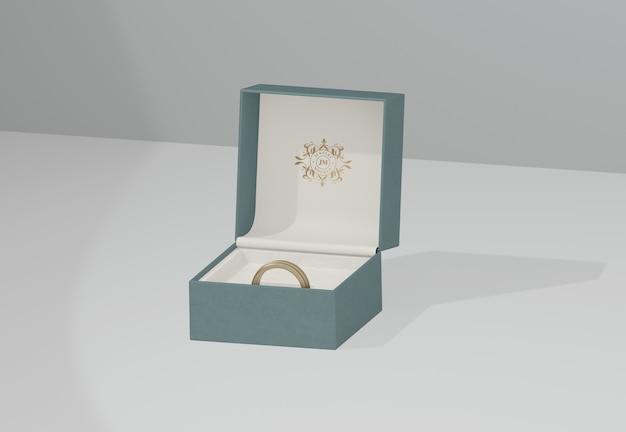 PSD green jewelry box with golden wedding ring