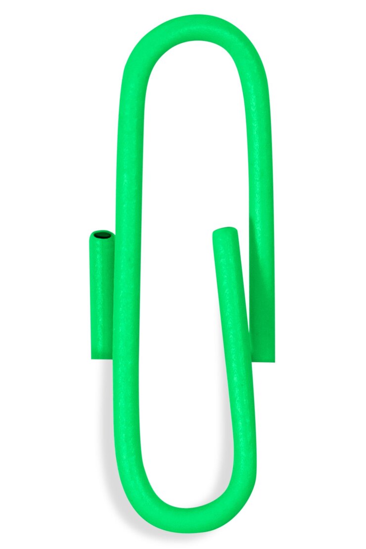 PSD green paper clip on a blank background