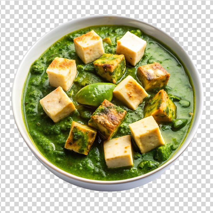 PSD green spinach gravy with soft paneer cubes isolated on white background