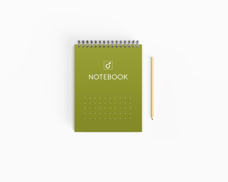 PSD green spiral notebook with a pencil