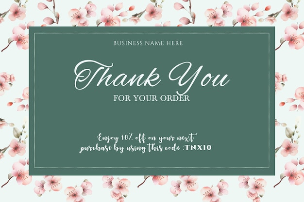 A green and white business card with pink flowers on it.