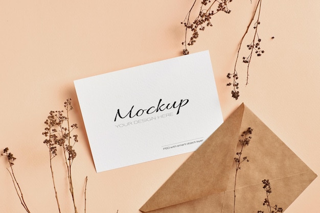Greeting card or invitation mockup with dry nature plants twigs decorations