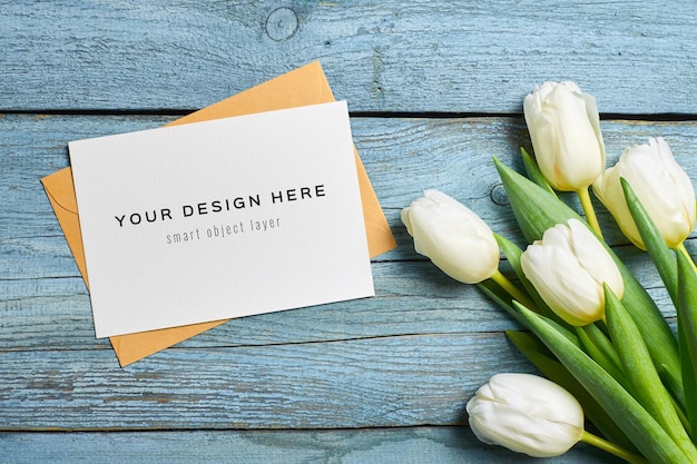 Greeting card mockup with envelope and tulip flowers