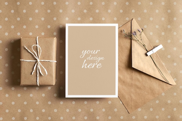 Greeting card stationary mockup with envelope and gift box