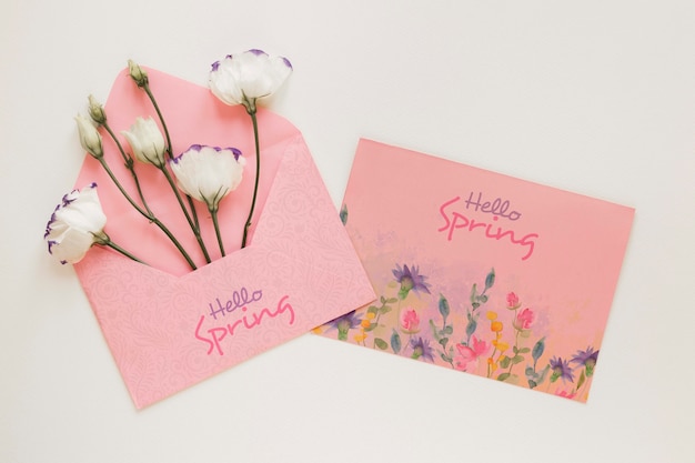 PSD greeting card with flowers in envelope