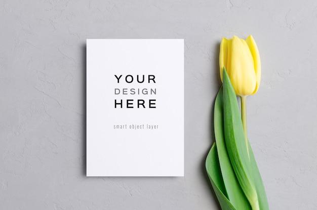 Greeting or invitation card mockup with yellow tulip flower