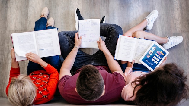 Group of friends at university studing together