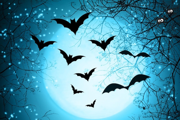 月明かりの夜に空を飛ぶハロウィーン・バットの群れ