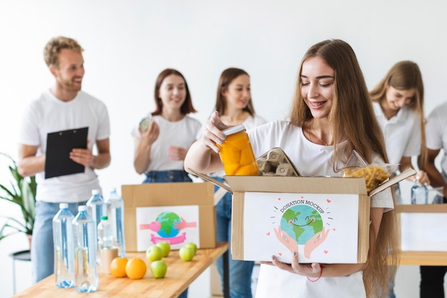 Group of people helping with donations