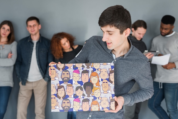 Group of people holding placard mockup for charity