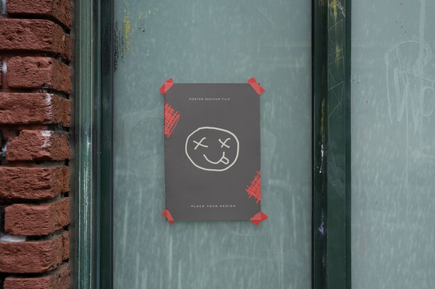 PSD grunge style poster mock-up on glass shop window