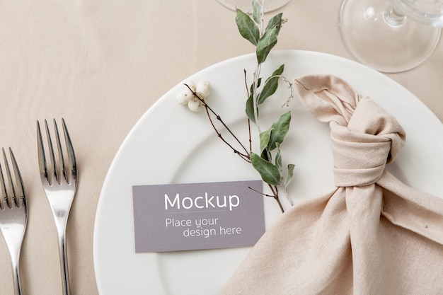 Guest card mockup on laid table