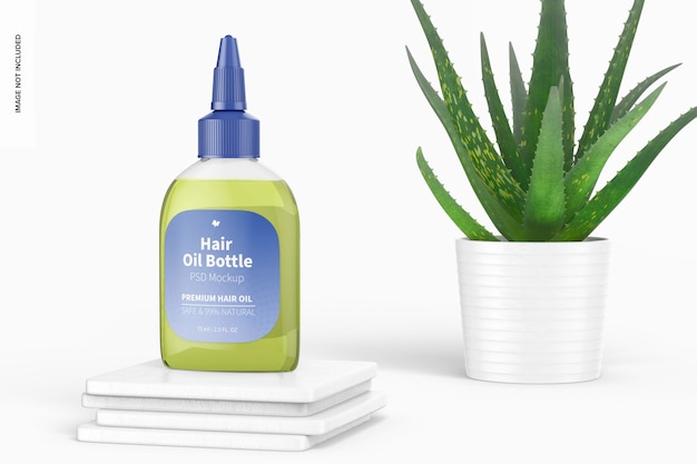 Mockup di bottiglia di olio per capelli con pianta di aloe