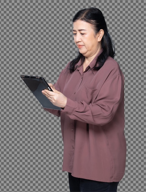 PSD half body portrait of 60s 70s elderly asian woman black hair purple shirt, use digital tablet. senior grandmother uses tablet social media front rear side back view over white background isolated