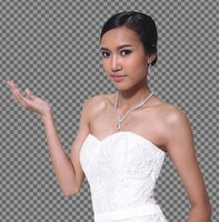 half body with palm hand sign of 20s asian woman in wedding bride dress with beautiful smile, isolated. tanned skin girl express feeling happy married, studio white background