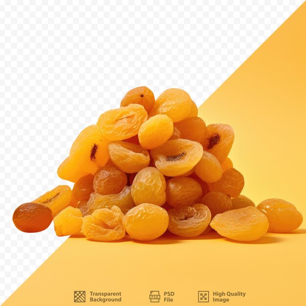 PSD half dried yellow cherry plums arranged alone on a dark surface