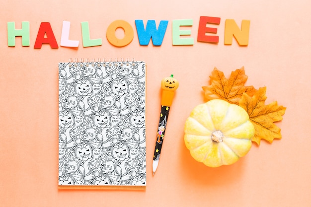 Halloween book cover mockup with pumpkin