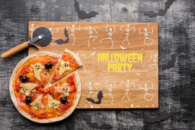 Halloween party with decorative pizza