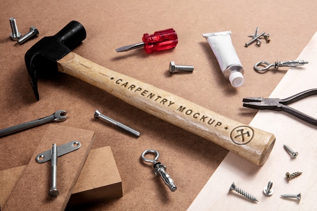 PSD hammer with wooden handle and engraved text effect mock-up