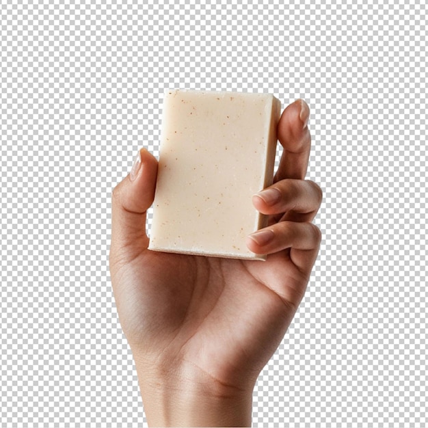 hand holding bar soap on white background
