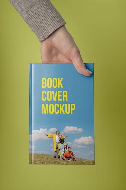 PSD hand holding  book mockup