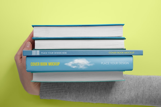 PSD hand holding  book mockup