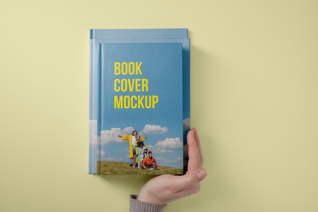 PSD hand holding  book mockup