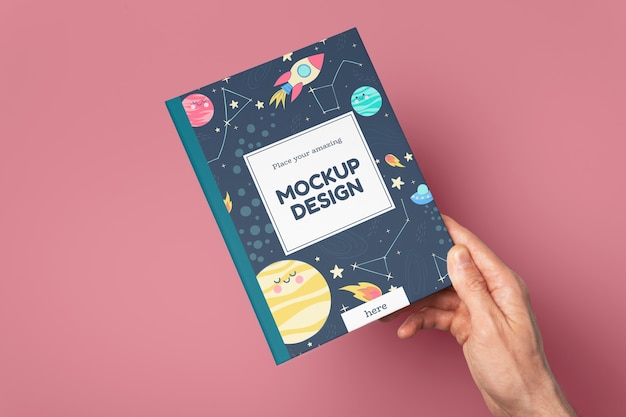 hand holding book mockup