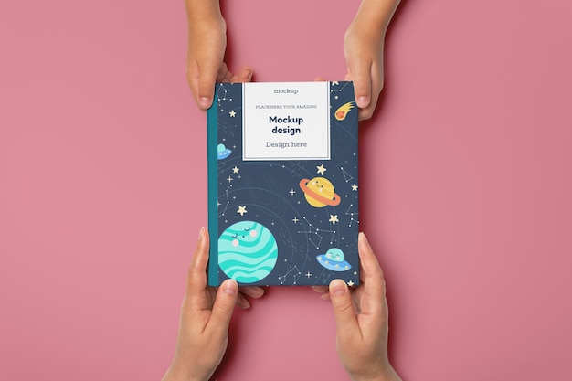 hand holding book mockup