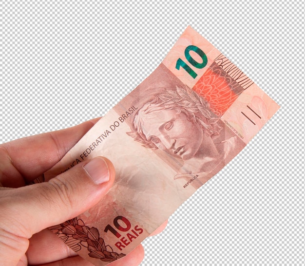 Hand holding Brazilian ten reais banknote png transparent background