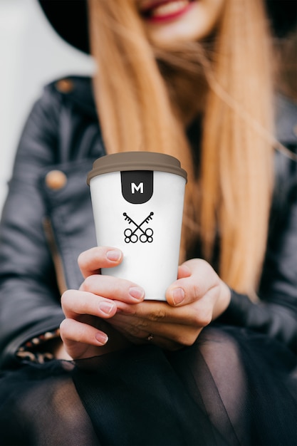 Hand Holding Coffee Cup Mockup