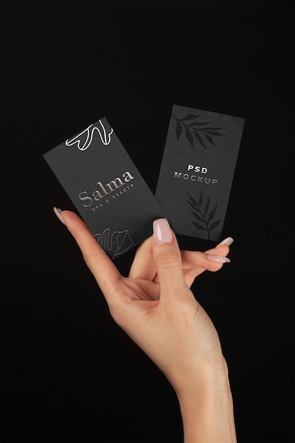 PSD hand holding embossed business card