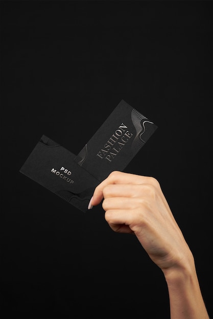 PSD hand holding embossed business card