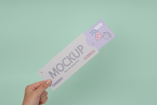 PSD hand holding gift card mockup