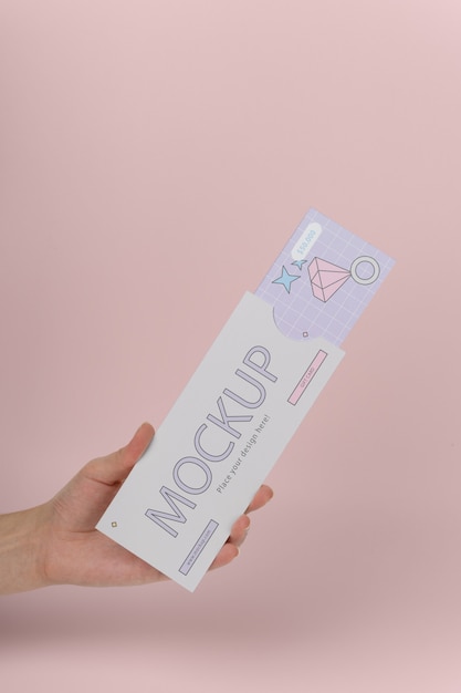 Hand holding gift card mockup